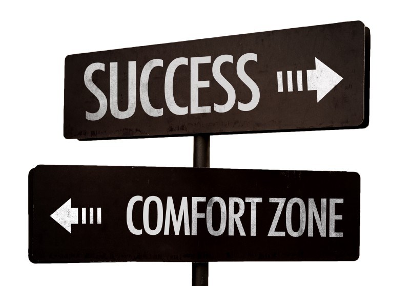 success and comfort zone direction sign