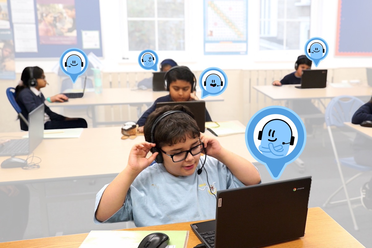 Pupils in one-to-one maths tutoring sessions with Skye, headsets on in the classroom